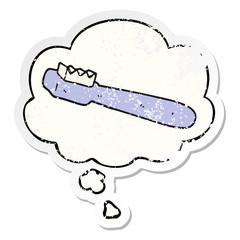 cartoon toothbrush and thought bubble as a distressed worn sticker