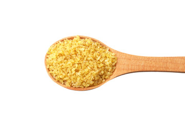 dry bulgur wheat in wooden spoon isolated on white background. top view