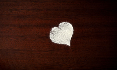 Kitchen desk and fresh white flour. Free space for your decoration. 