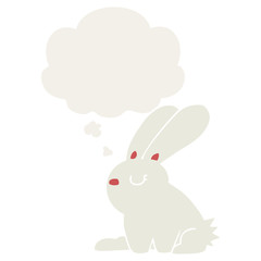 cartoon rabbit and thought bubble in retro style