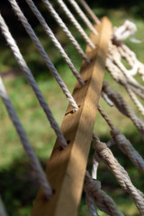 hammock details with rope and knots, in the shade under the tree