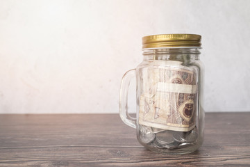 Glass jar for savings