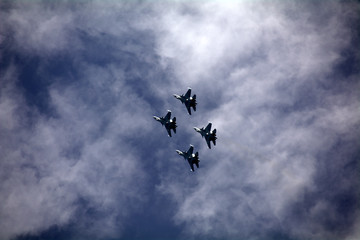 Naklejka na ściany i meble combat aircraft in the sky
