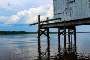 old rustic boathouse and diving board on the Mattaponi River