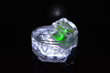 Very beautiful and stunning images of drinks with glowing ice cubes.  Bright colors with bubbles in...