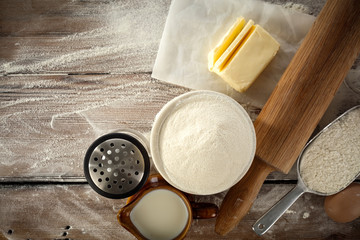 Fototapeta na wymiar Kitchen desk and fresh white flour. Free space for your decoration. 