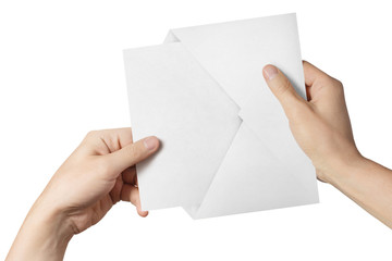 Hands pulling a blank paper out of a white envelope, isolated on white background