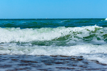 Waves on the sea in a club closeup.