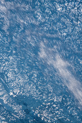 Fototapeta na wymiar Water jet from a fresh spring