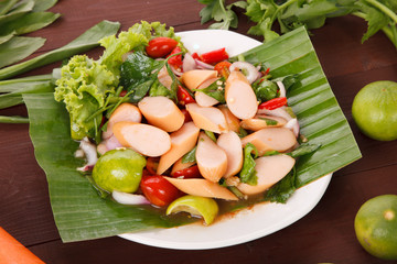 Hot and spicy sour Thai Salads. With sausage.