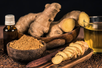 Sliced Ginger Root and Ginger Powder in the Bowl