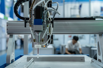 automation machine and detail close up in machine automatic with robotic automation technology for technology production factory