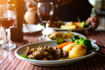Plate of Cypriot dish kleftiko with juicy lamb.