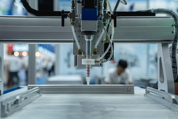 automation machine and detail close up in machine automatic with robotic automation technology for technology production factory