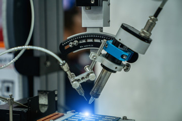 automation machine and detail close up in machine automatic with robotic automation technology for technology production factory