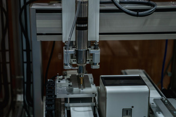 automation machine and detail close up in machine automatic with robotic automation technology for technology production factory