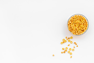 Corn cereals in bowls on white background top view space for text