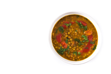 Indian lentil soup dal (dhal) in a bowl isolated on white background. Top view. Copyspace