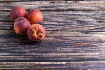 peaches on wooden table