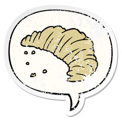 cartoon croissant and speech bubble distressed sticker