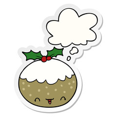 cute cartoon christmas pudding and thought bubble as a printed sticker