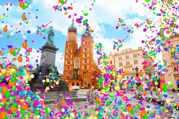 Obraz premium Rynek Glowny Krakow Poland with air balloons fly