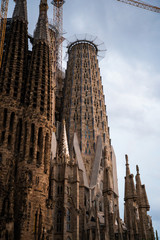 BARCELONA, SPAIN - April 2019: Sagrada Familia on April 9, 2018 in Barcelona, Spain. This impressive cathedral was originally designed by Antoni Gaudi is still being built since 1882.