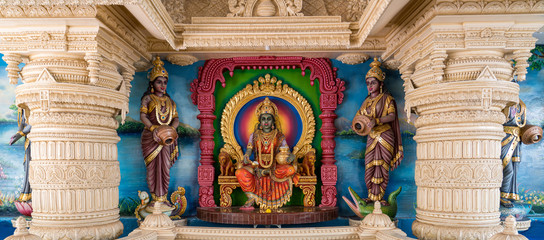Colourful statues of Hindu religious deities in Hindu temple in Singapore	