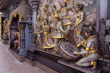 Fototapeta na wymiar Colourful statues of Hindu religious deities in Hindu temple in Singapore 