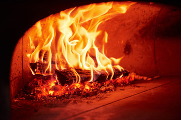 Fire burning in the furnace. Close up view of wood in flames