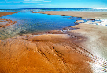 landscape of sandy ocean shore