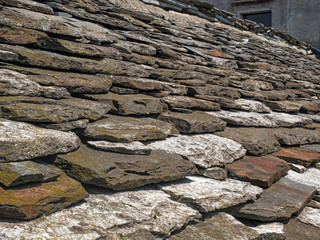 traditional roof of a house covered by gneiss in the mountainous area of Verbano Cusio Ossola