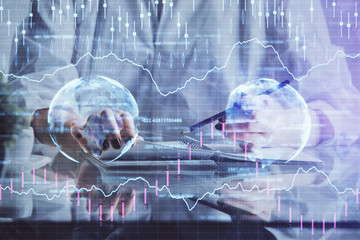 Financial chart drawn over hands taking notes background. Concept of research. Multi exposure