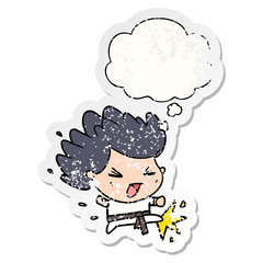 cartoon kicking karate champ and thought bubble as a distressed worn sticker