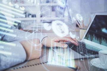 Businessman working on Laptop with technology theme drawing. Concept of big data. Double exposure.