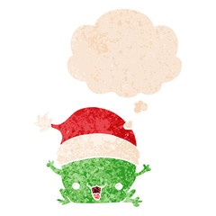 cute cartoon christmas frog and thought bubble in retro textured style