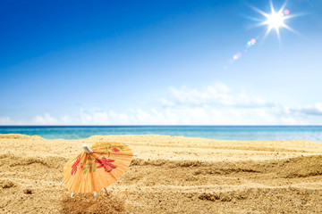 Fototapeta na wymiar Summer photo of beach and umbrella 