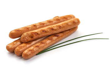 Grilled chicken hot dog sausages, close-up, isolated on white background