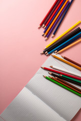 stack of books with pencil and eraser on white background