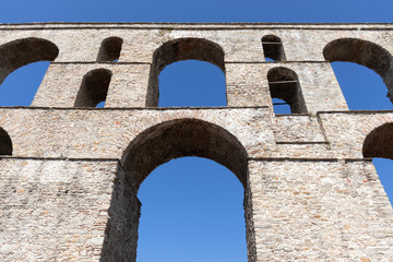 Fototapeta na wymiar Old aqueduct in city of Kavala, Greece