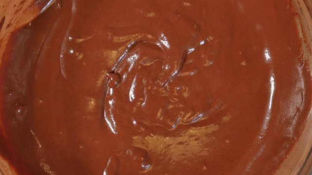 taster chocolate cream with finger, love chocolate, tasty chocolate, chocolate lover. top view 