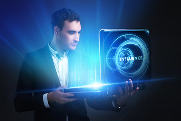 The concept of business, technology, the Internet and the network. A young entrepreneur working on...