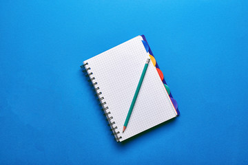 notebook and pen on white background