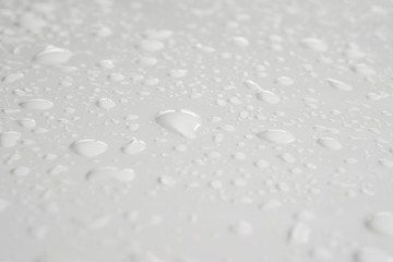 water drop on white background drops of rain on car