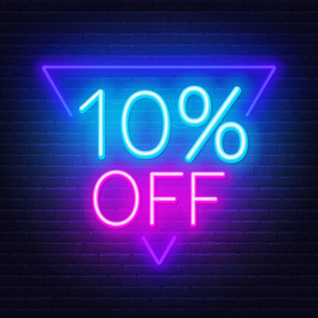 10 percent off neon lettering on brick wall background