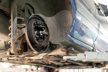 Fototapeta premium Car repair, rear drum brake repair