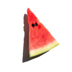 Watermelon slice isolated on white background. Fresh summer fruit.