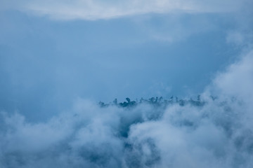 Naklejka na ściany i meble Mountain and fog at Champasak, Laos