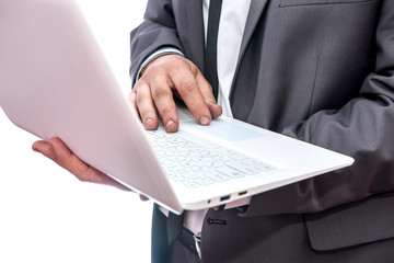 Male hands with laptop isolated on white