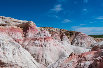 Landscape of pink and white rock formations at Interpretive Paint Mines in Colorado